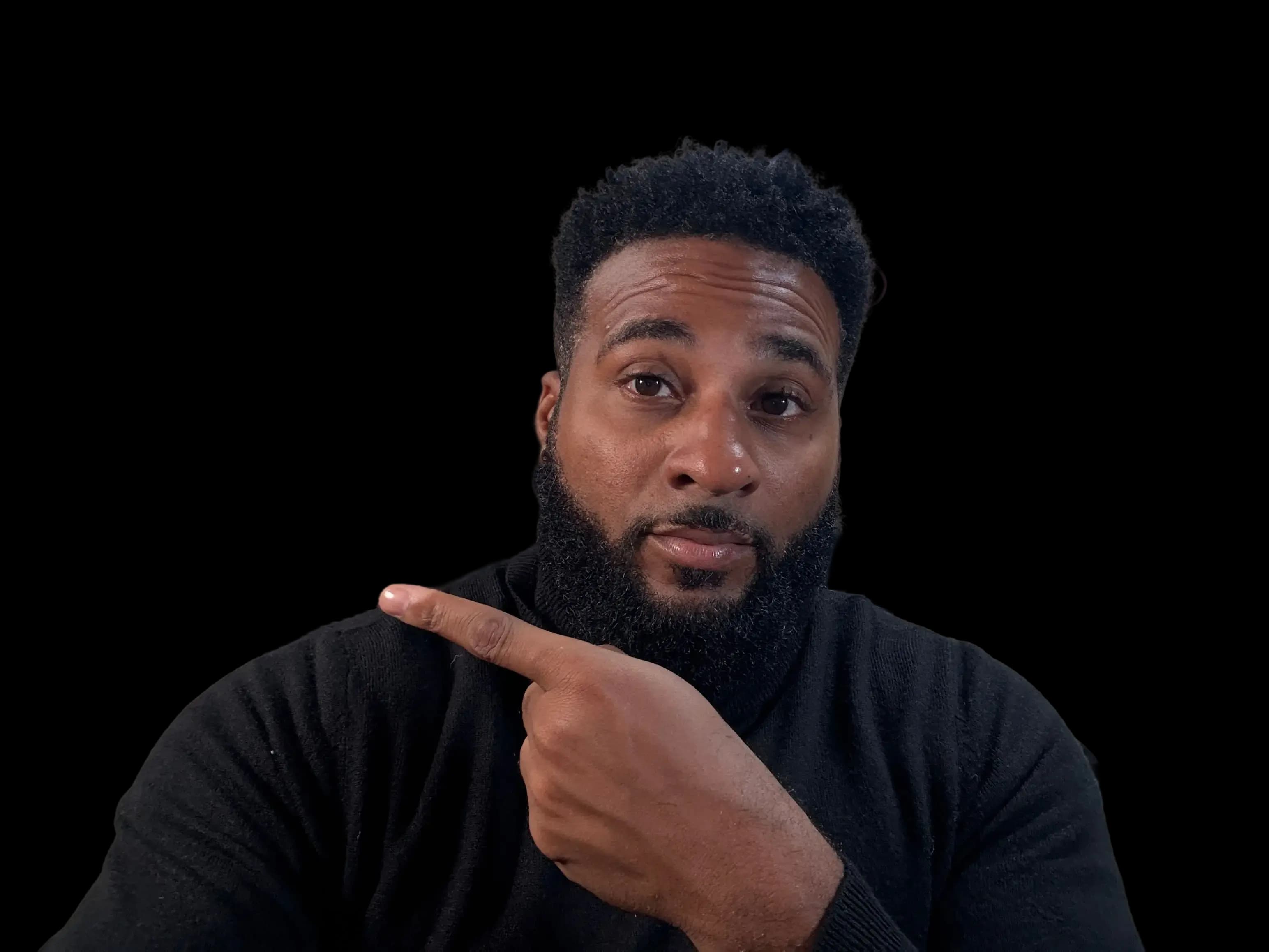 Mike Eyo pointing towards the headline